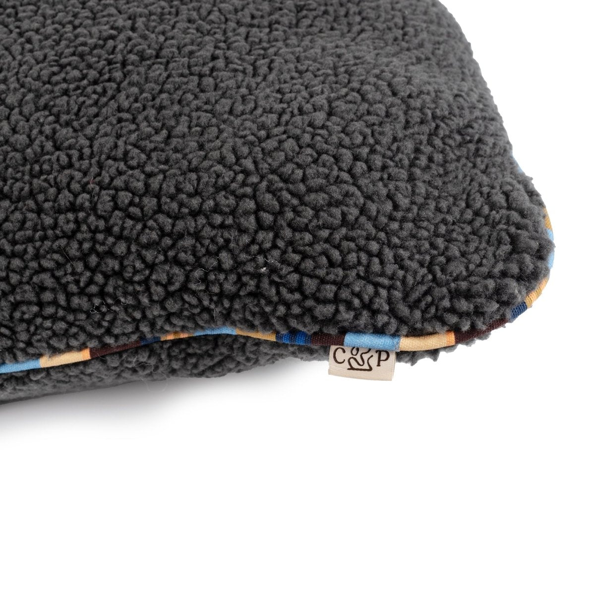 Brand stripe cotton cording detail on the Orthopedic Foam Dog Bed